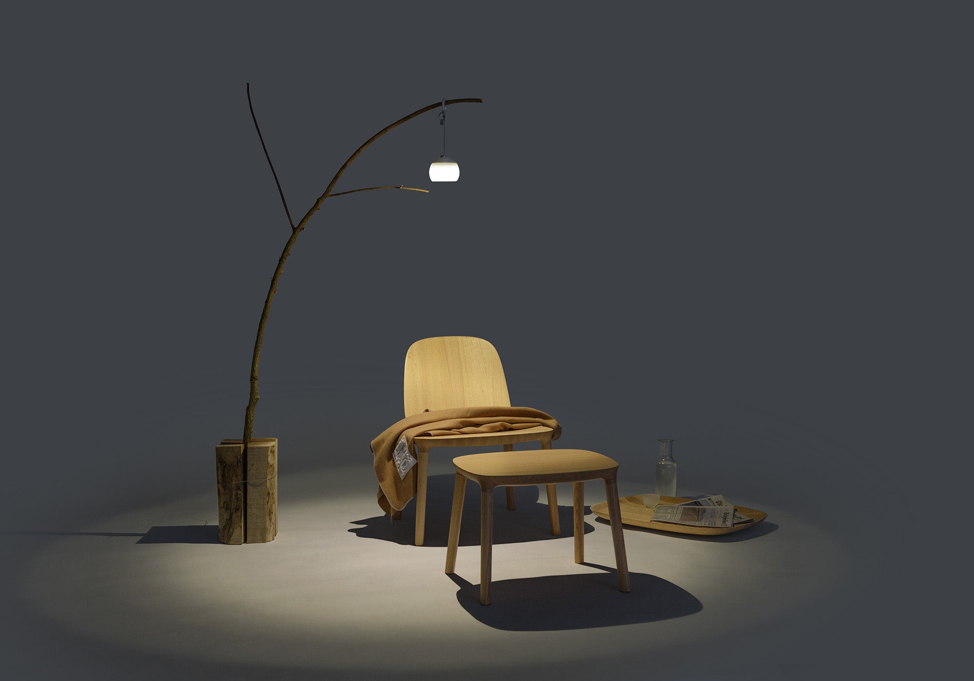 Kokoro Lounge Chair in oak natural paired with Ottoman, highlighting comfort and cohesive design in a relaxed setting.