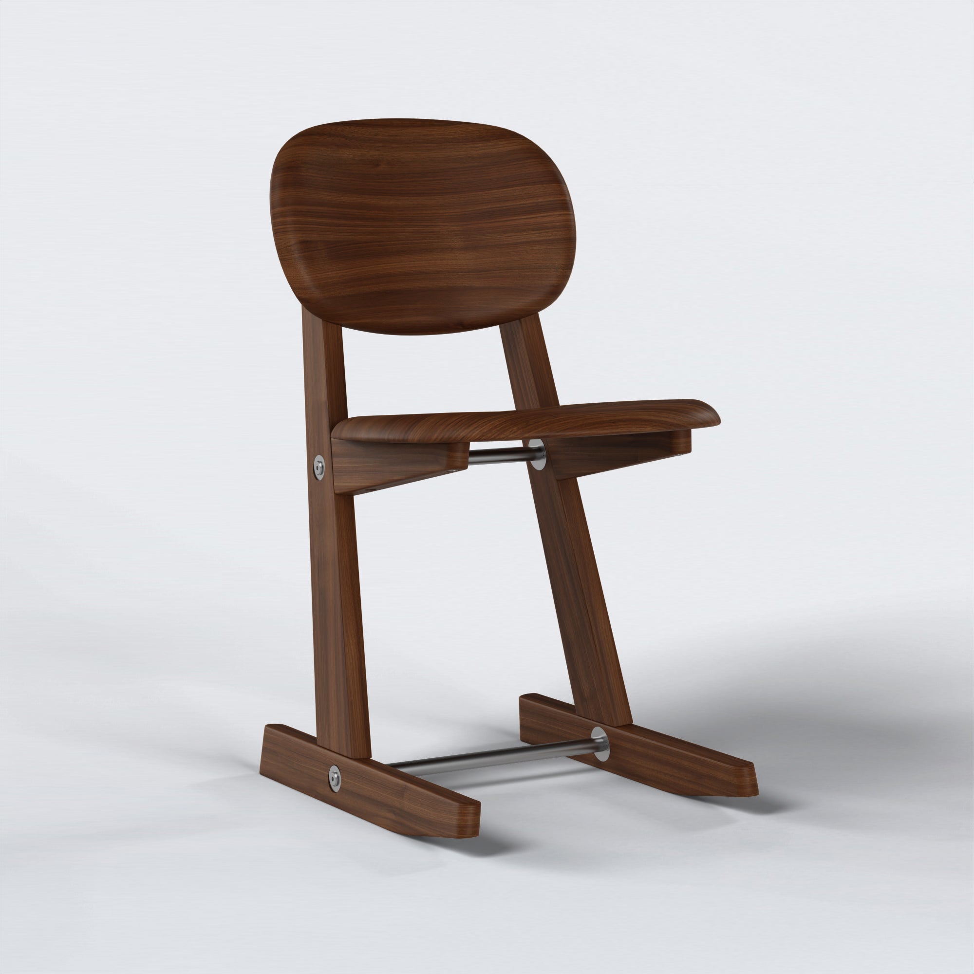 Side angle of KufenKarl Office Tipforward KD in Walnut Dark with stainless steel – showcasing the sturdy yet refined craftsmanship.