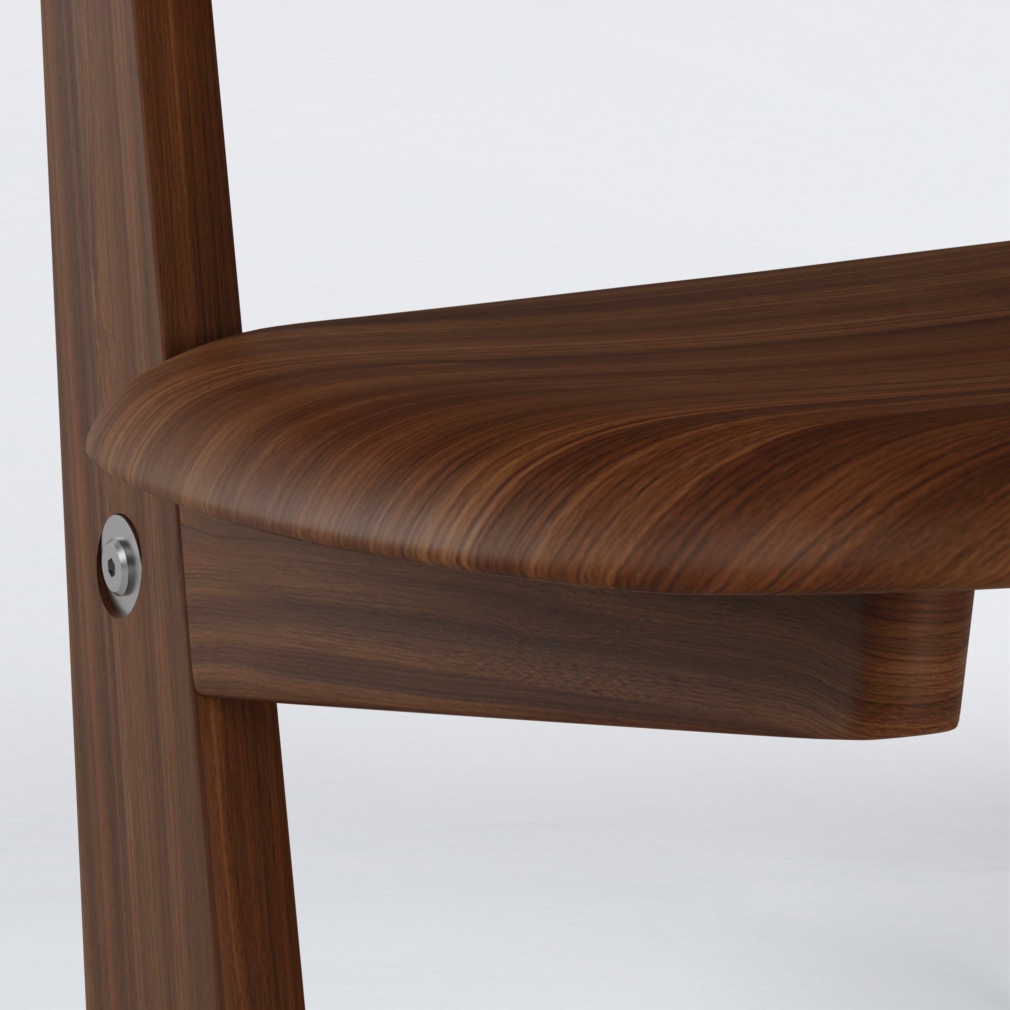 Close-up detail of the walnut KufenKarl Lounge Chair KD (walnut dark, Collect.Studio) – showing fine craftsmanship and stainless steel accents.