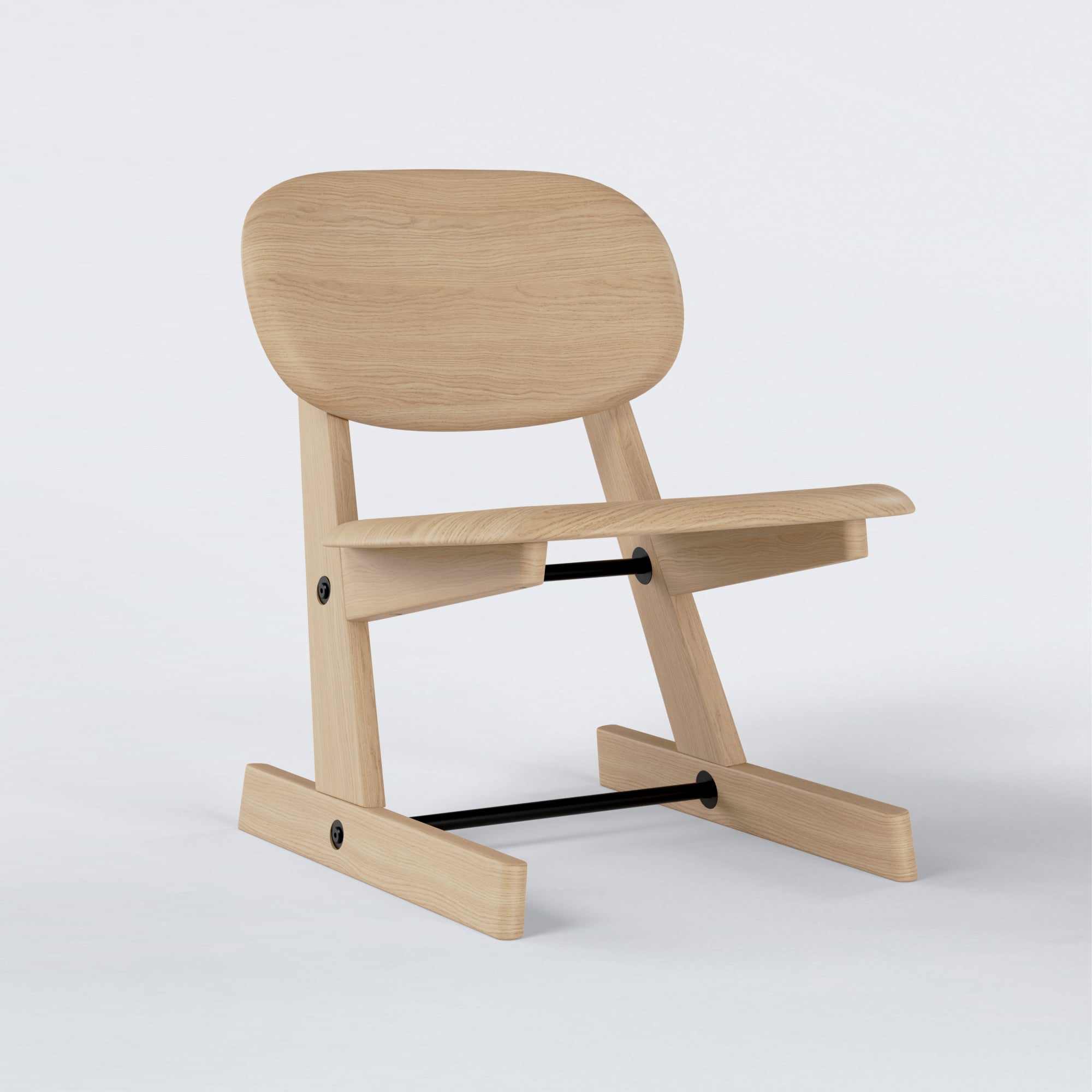 KufenKarl Lounge Chair KD in natural oak with black metal frame, side angle view (Oak nature, Collect.Studio) – emphasizing the smooth curves and modern silhouette.