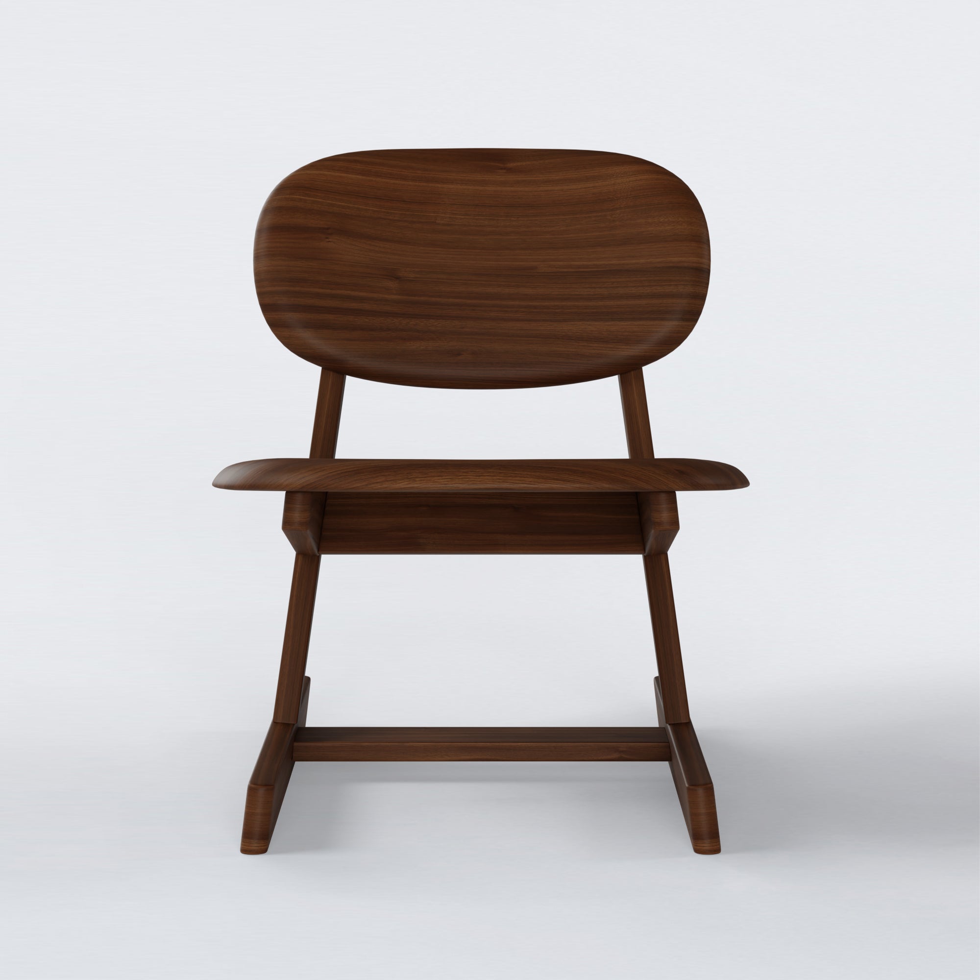 KufenKarl Lounge Chair in walnut dark – front view, offering a timeless and elegant appeal.