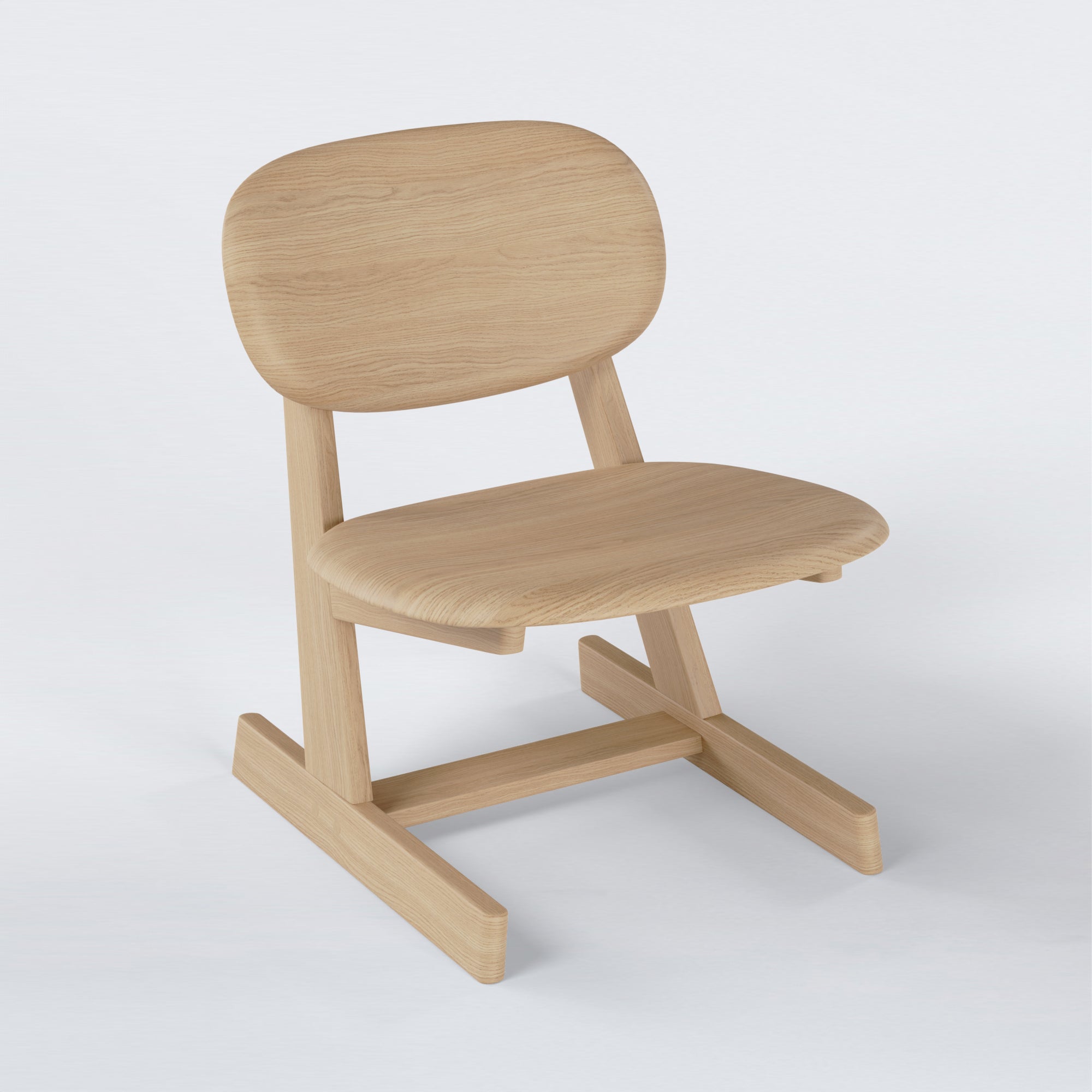 KufenKarl Lounge Chair in natural oak – three-quarter view, highlighting its balanced proportions and ergonomic form.