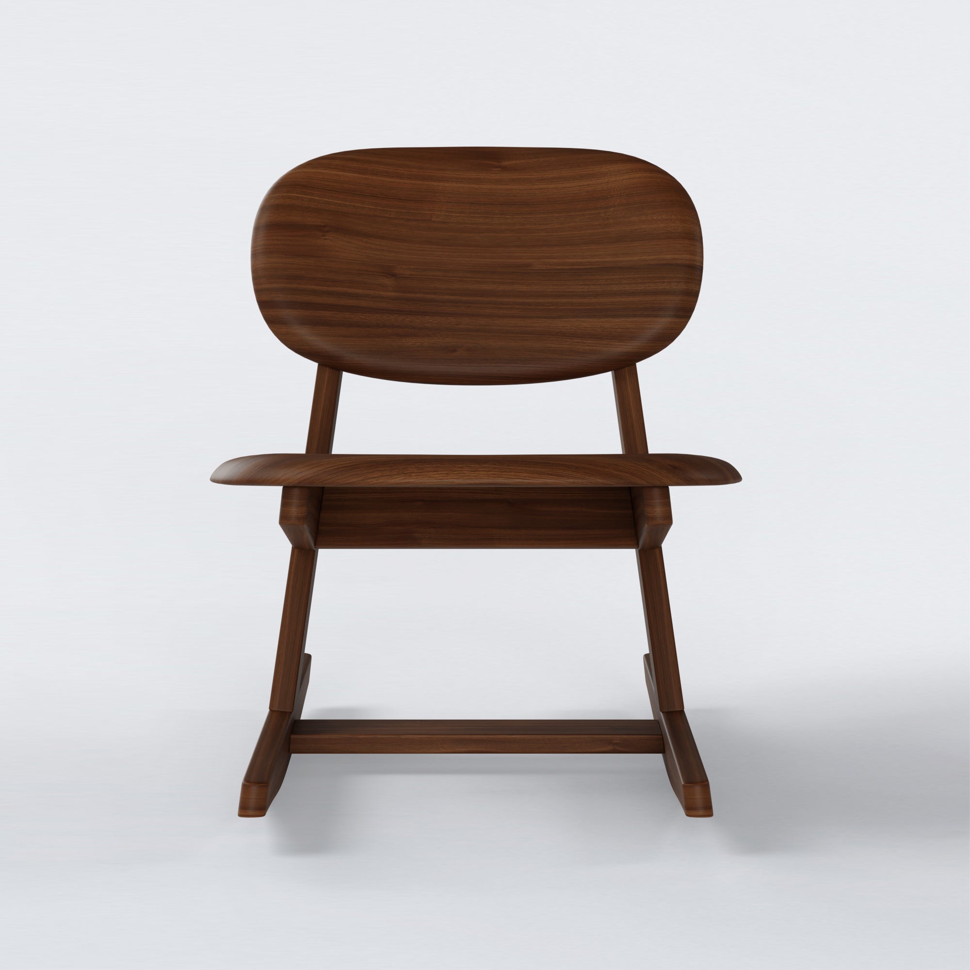 KufenKarl Rocking Chair in walnut dark – front view, displaying its ergonomic design and smooth curved seat.