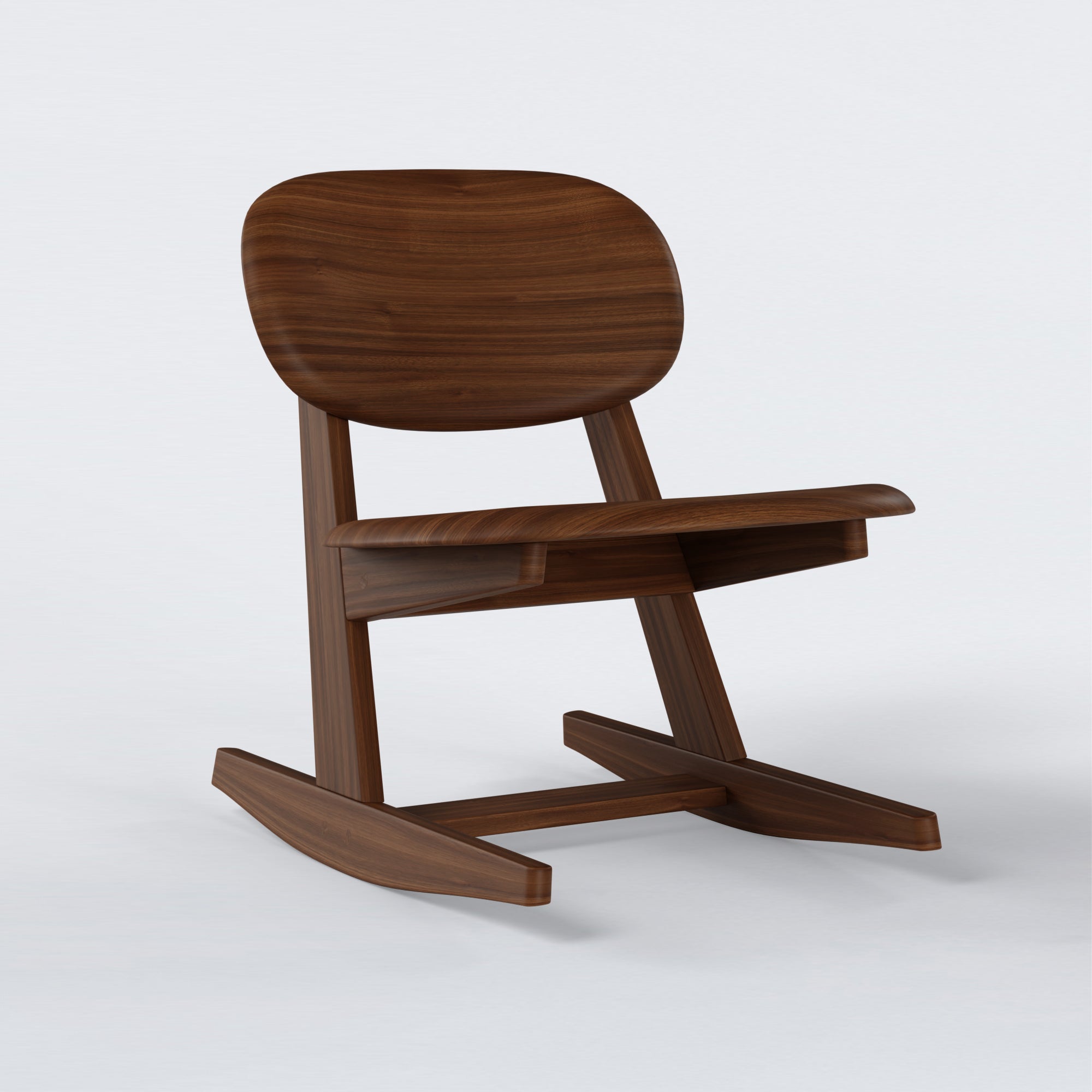 KufenKarl Rocking Chair in walnut – angled view, emphasizing its smooth rocking motion and sturdy frame.