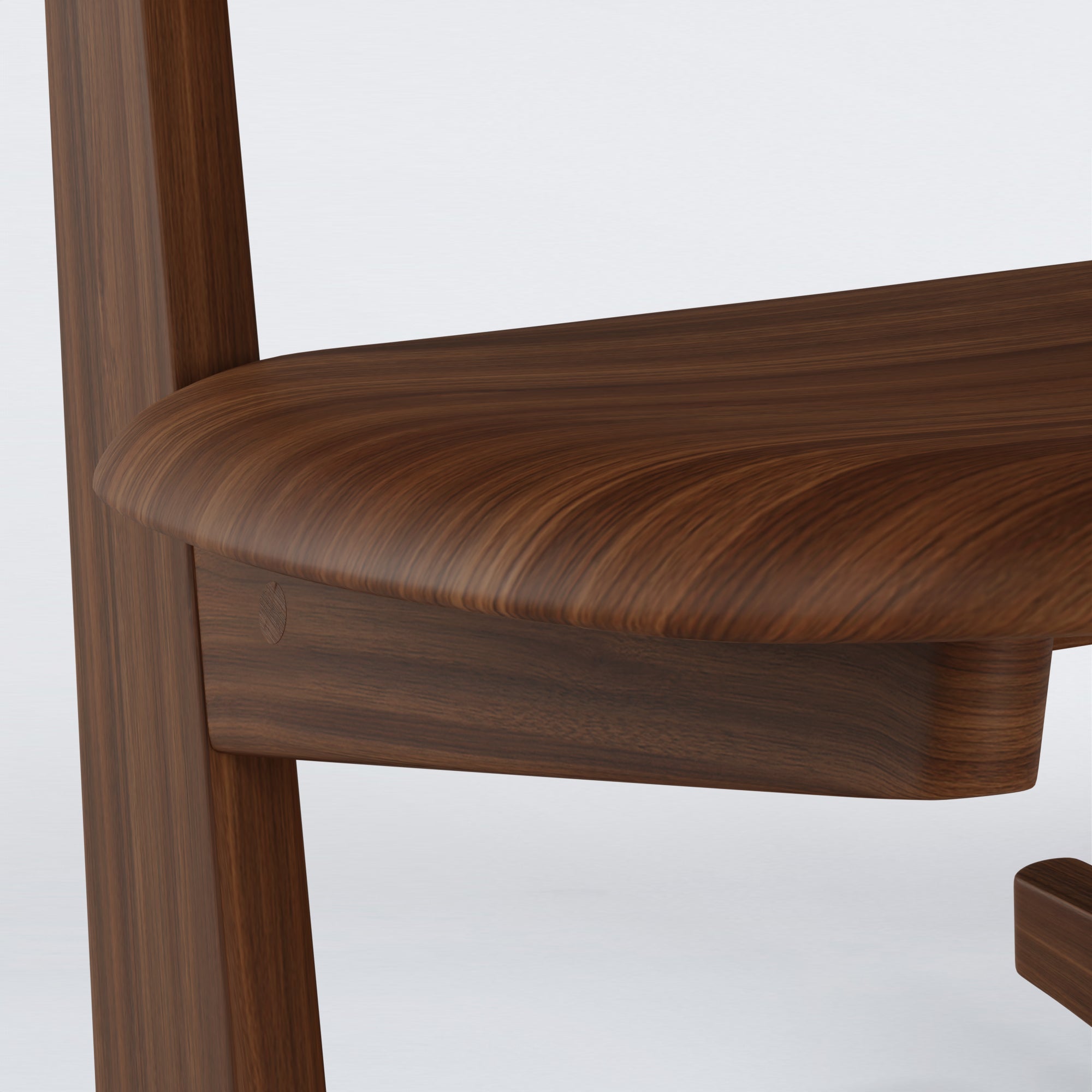 Close-up of KufenKarl Rocking Chair in walnut, highlighting the high-quality craftsmanship and natural wood grain.