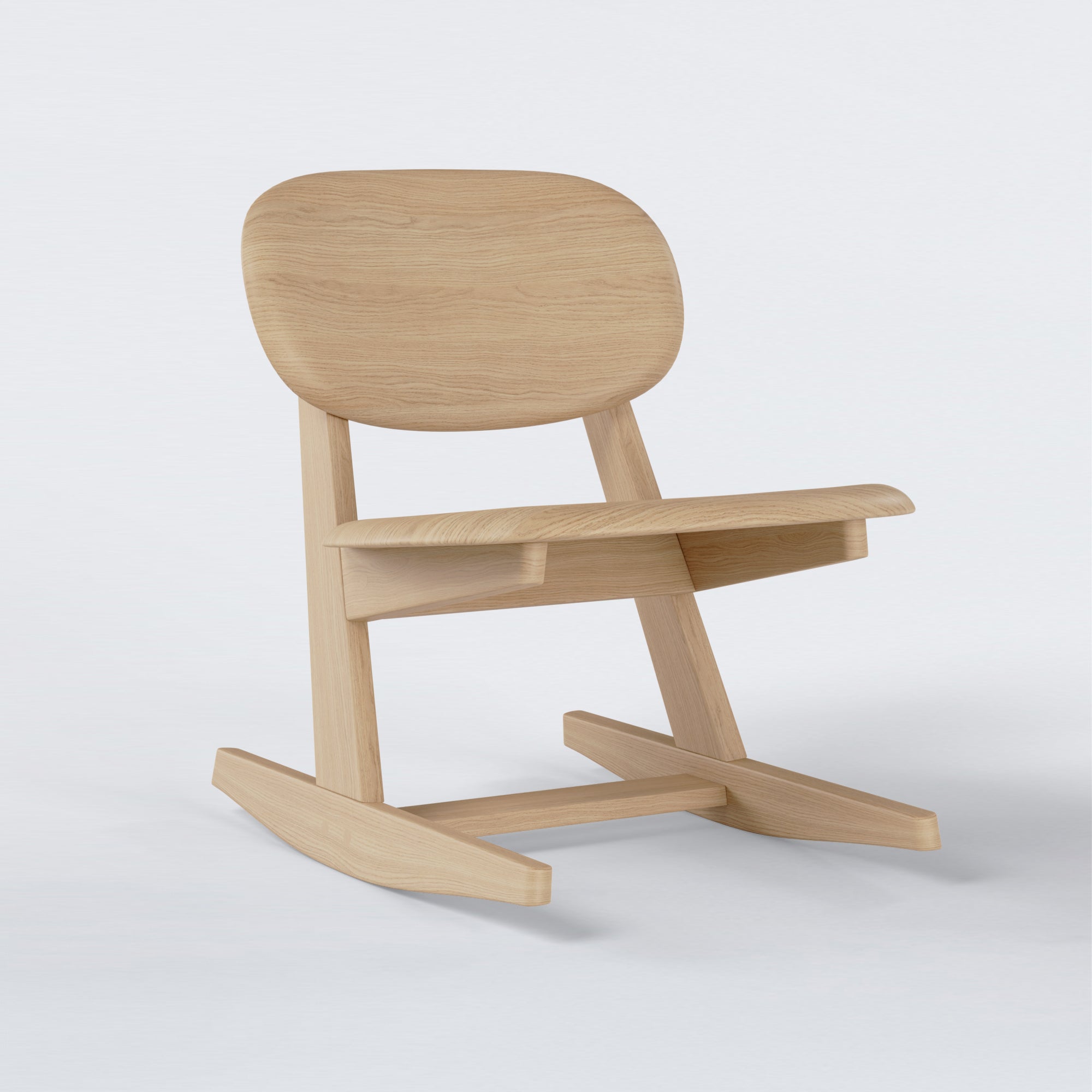 KufenKarl Rocking Chair in natural oak – angled side view, capturing the smooth rocking motion and sturdy frame.
