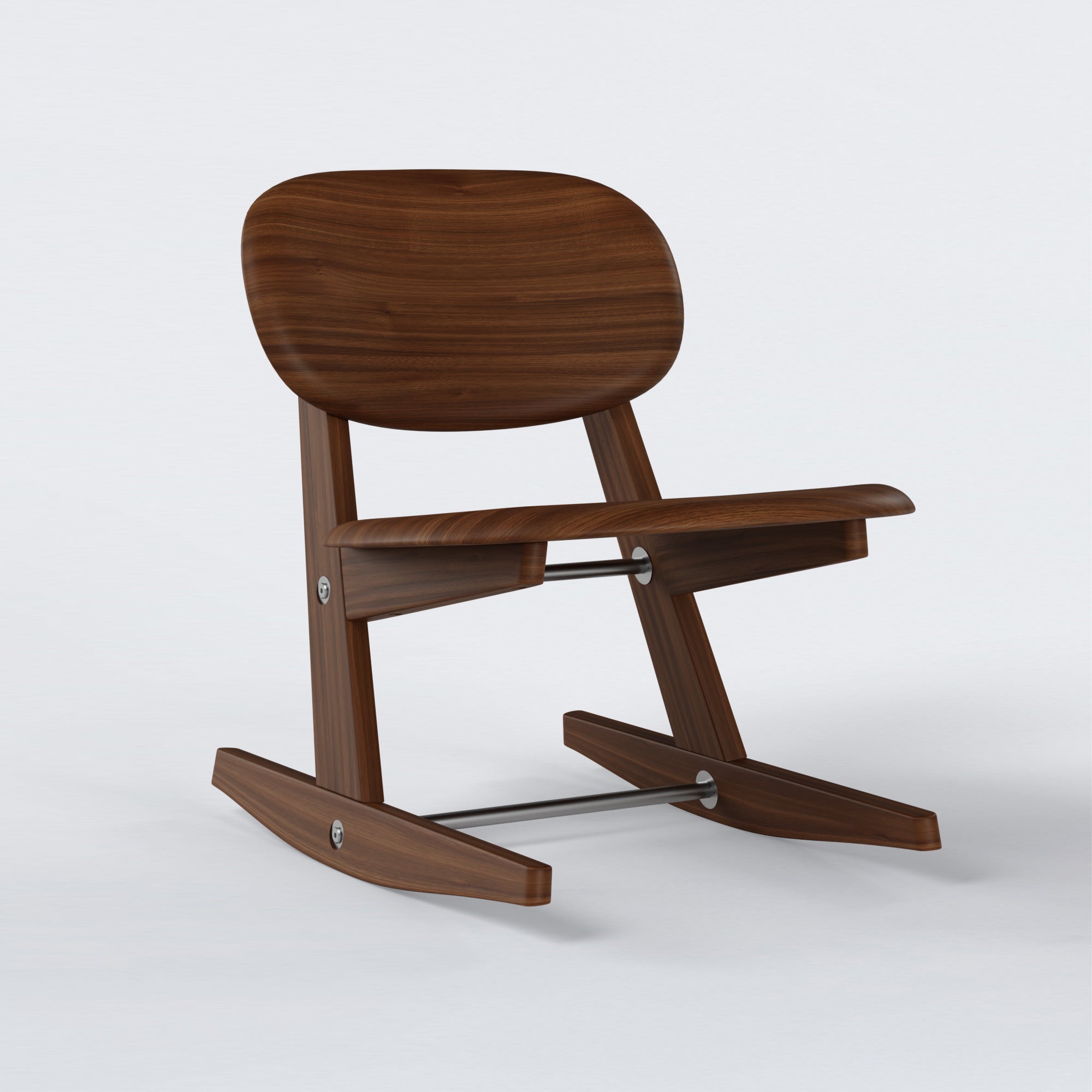 KufenKarl Rocking Chair KD in walnut – angled side view, displaying its smooth rocking base and precise joinery.