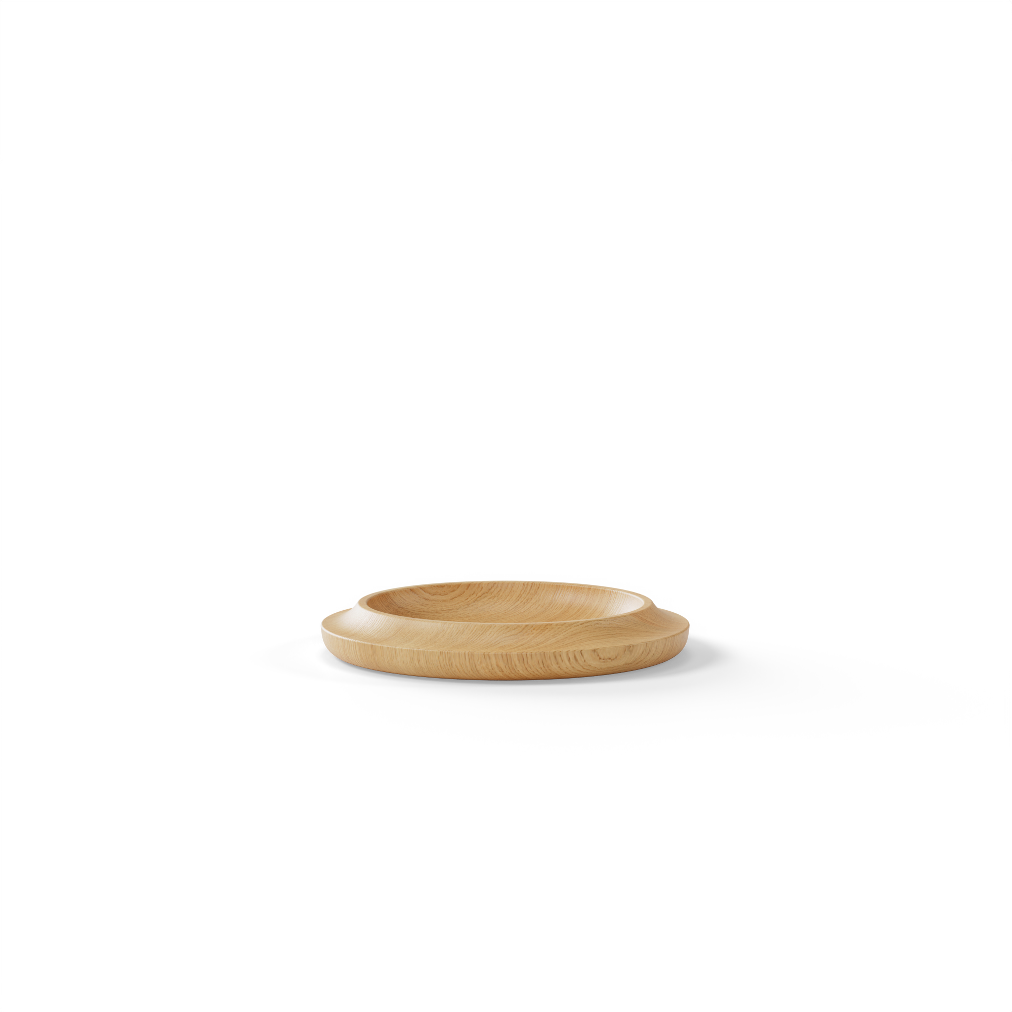 WAAN Table Bowl in natural oak—a handcrafted wooden bowl blending functionality and sculptural beauty.