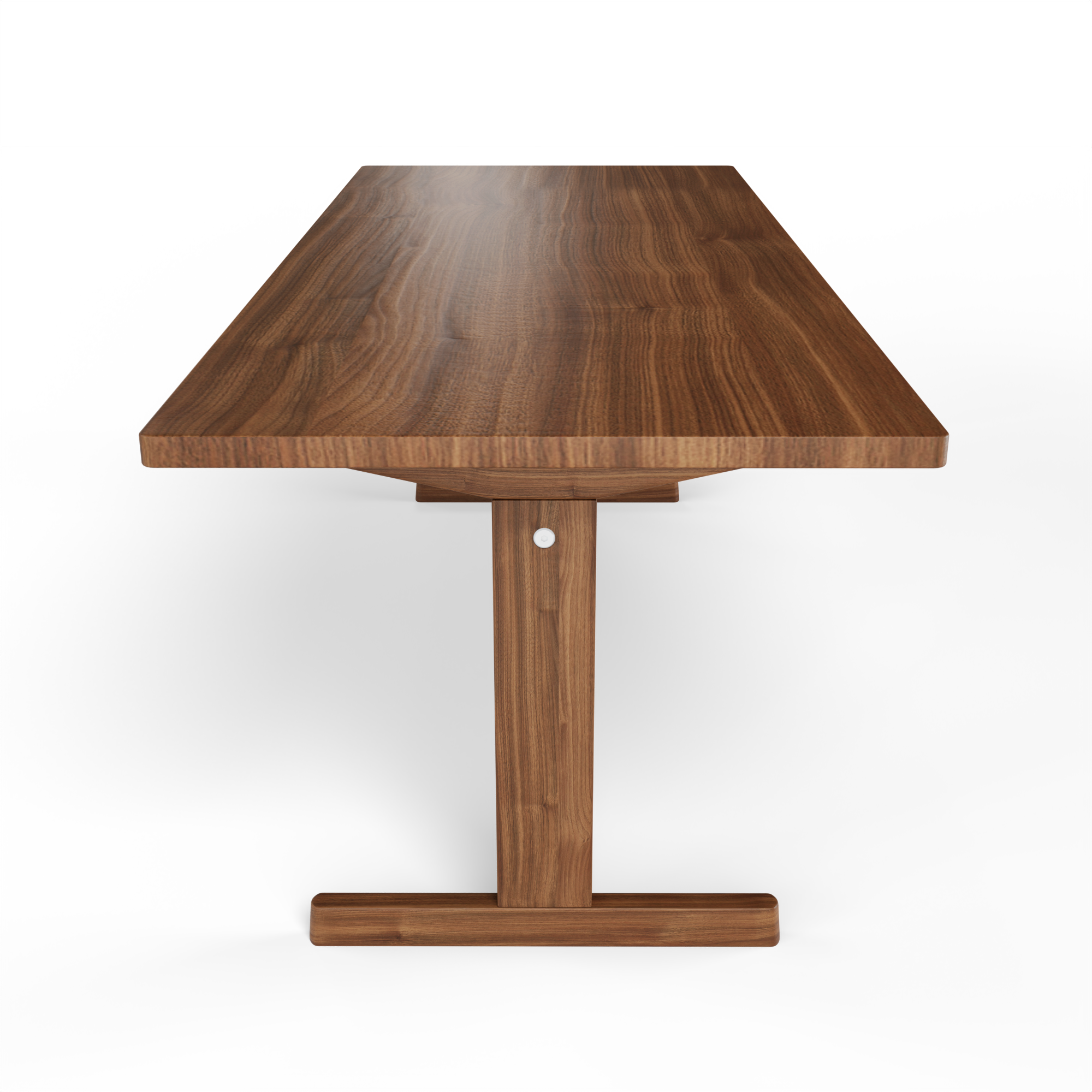 KufenKarl Table in walnut – perspective shot, illustrating its suitability for refined interiors.